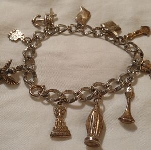 Creed Sterling Silver Charm Bracelet